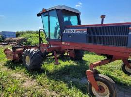 1994 Hesston 8200 Self-Propelled Windrowers and Sw