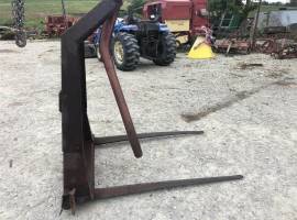 New Holland 80 Loader and Skid Steer Attachment