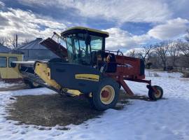 2007 New Holland HW305 Self-Propelled Windrowers a